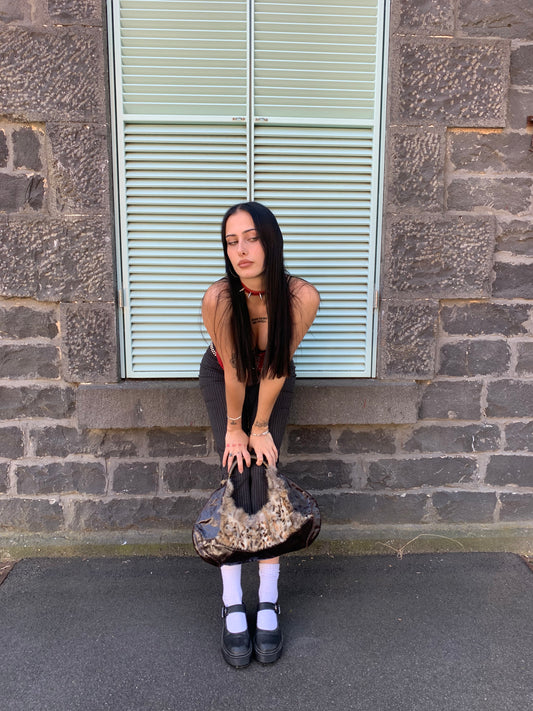 CUNTY brass handle angora fur shoulder bag
